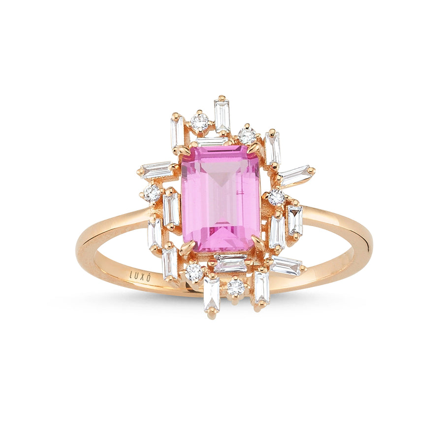 merkezinde pembe topaz taş, yuvarlak ve baget pırlantalarla çevrili rose atlın yüzük