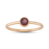 Merkezinde radolite taşlı rose altın tektaş yüzük